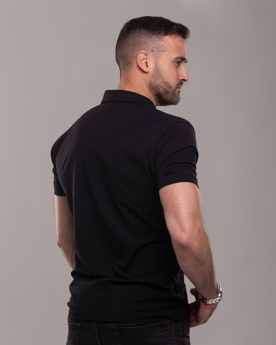 ๐ง๐ต๐ฒ ๐๐ฒ๐ฎ๐น ๐ ๐ฎ๐ธ๐ฒ๐ฟ | Polo majica - Black